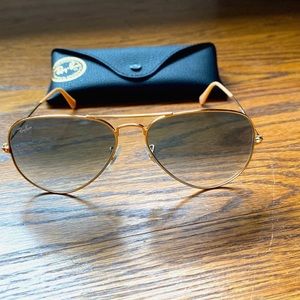 Ray Ban Aviators- gold based with gray lenses.